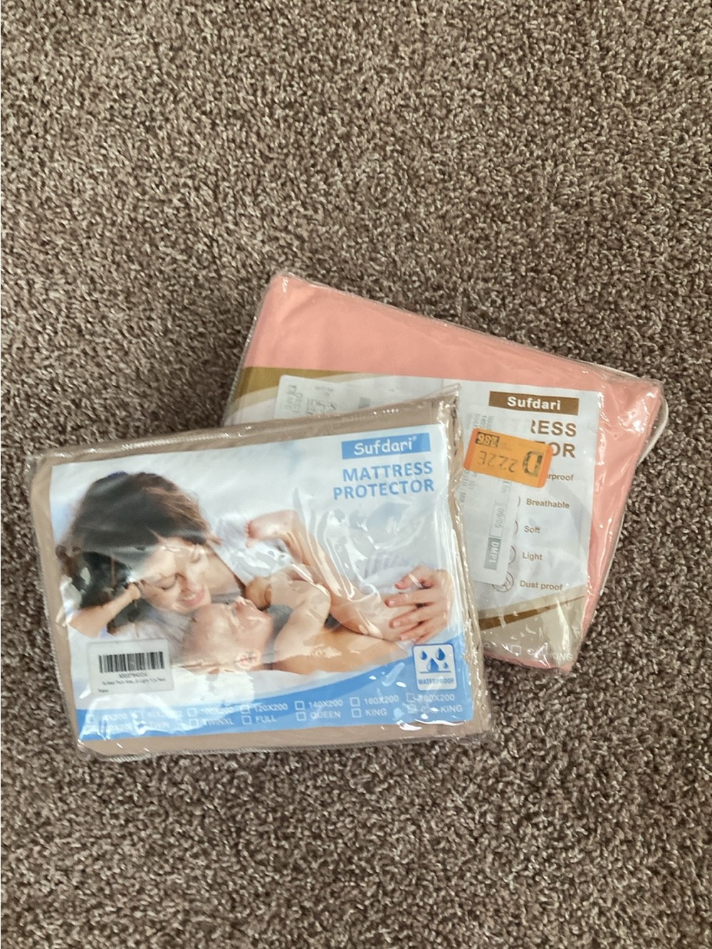 2 NEW In-Package Twin Waterproof Mattress Protectors - 1 Tan, 1 Pinky-Peach